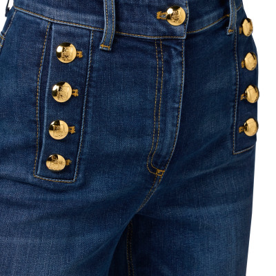JEANS A ZAMPA ELASTICIZZATO CON BOTTONIERA LATERALE